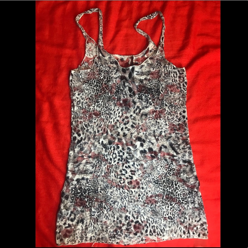 Lace animal print Cami 95% polyester 5% spandex.